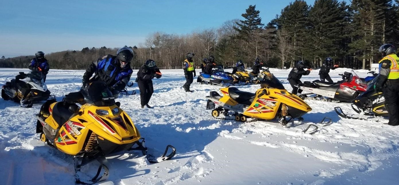 Newly hired WDNR wardens complete snowmobile safety.)