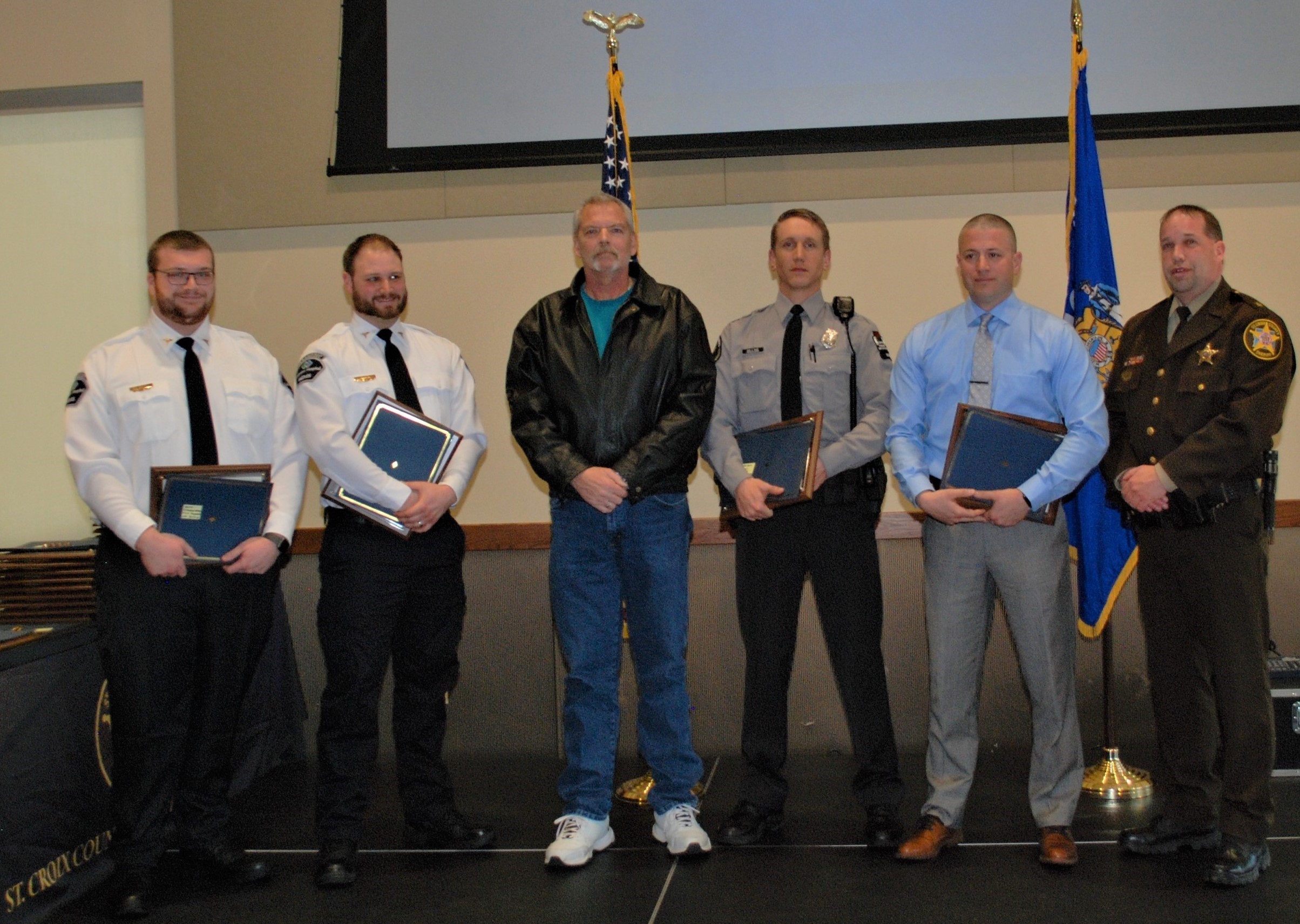 From left to right, Lakeview Paramedics Kevin Zimmerman and Jeff Price, Keith Butterfield, Warden Isaac Kruse, St. Croix County Deputy Nick Krueger and St. Croix County Sheriff Scott Knudson.